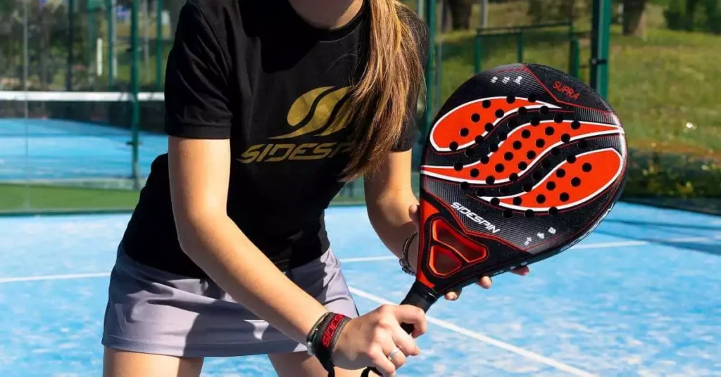 padel tennis player with red racket