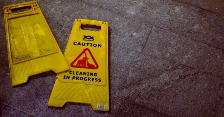 tennis court cleaning equipment caution sign