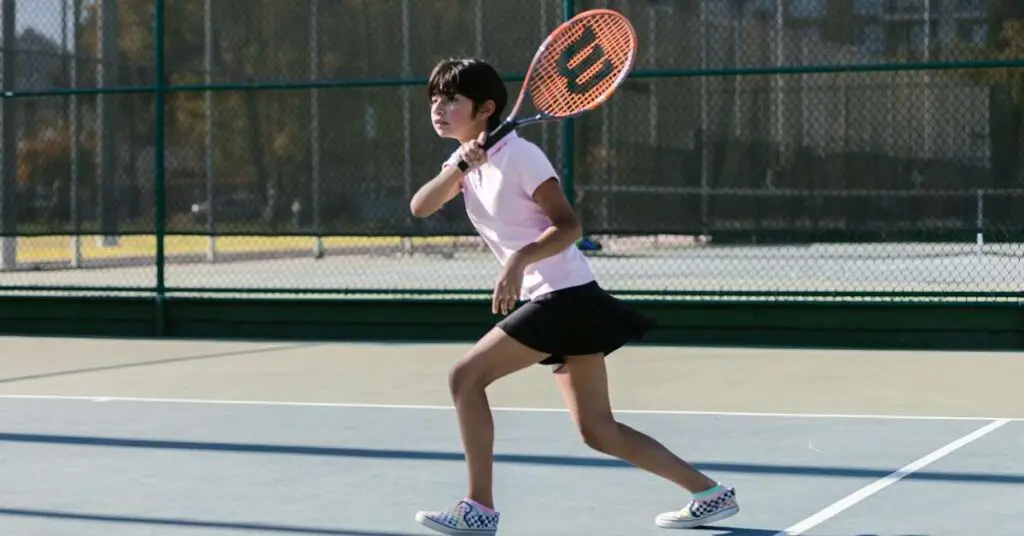girl with Wilson tennis racket