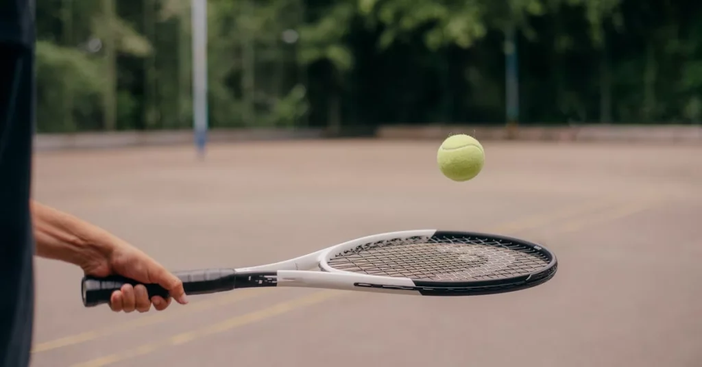 tennis racket with tennis ball