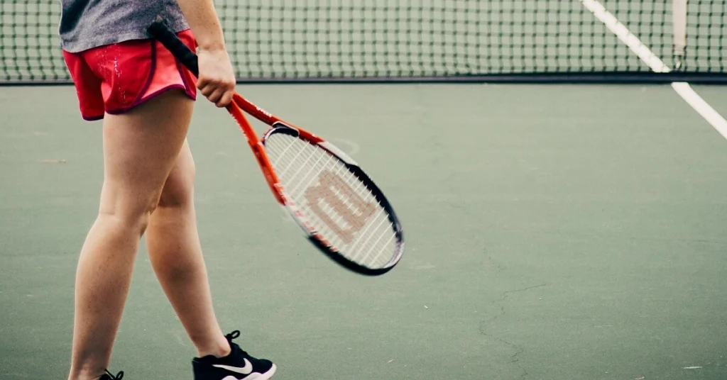 girl with Wilson tennis racket