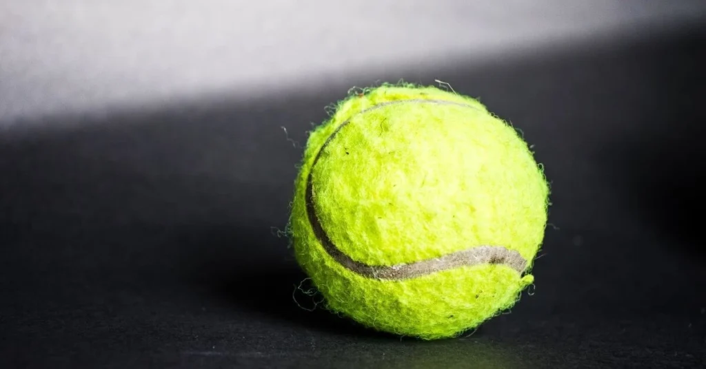 tennis players keep an extra ball