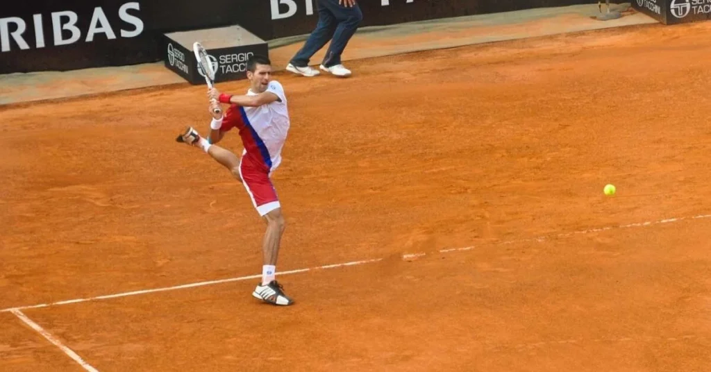 Djokovic returning the tennis ball