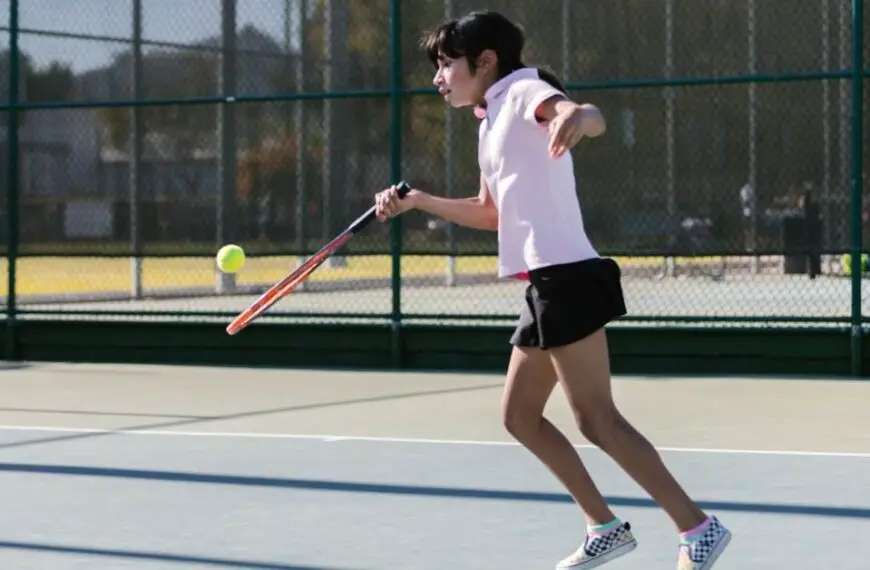 player hitting a lob in tennis
